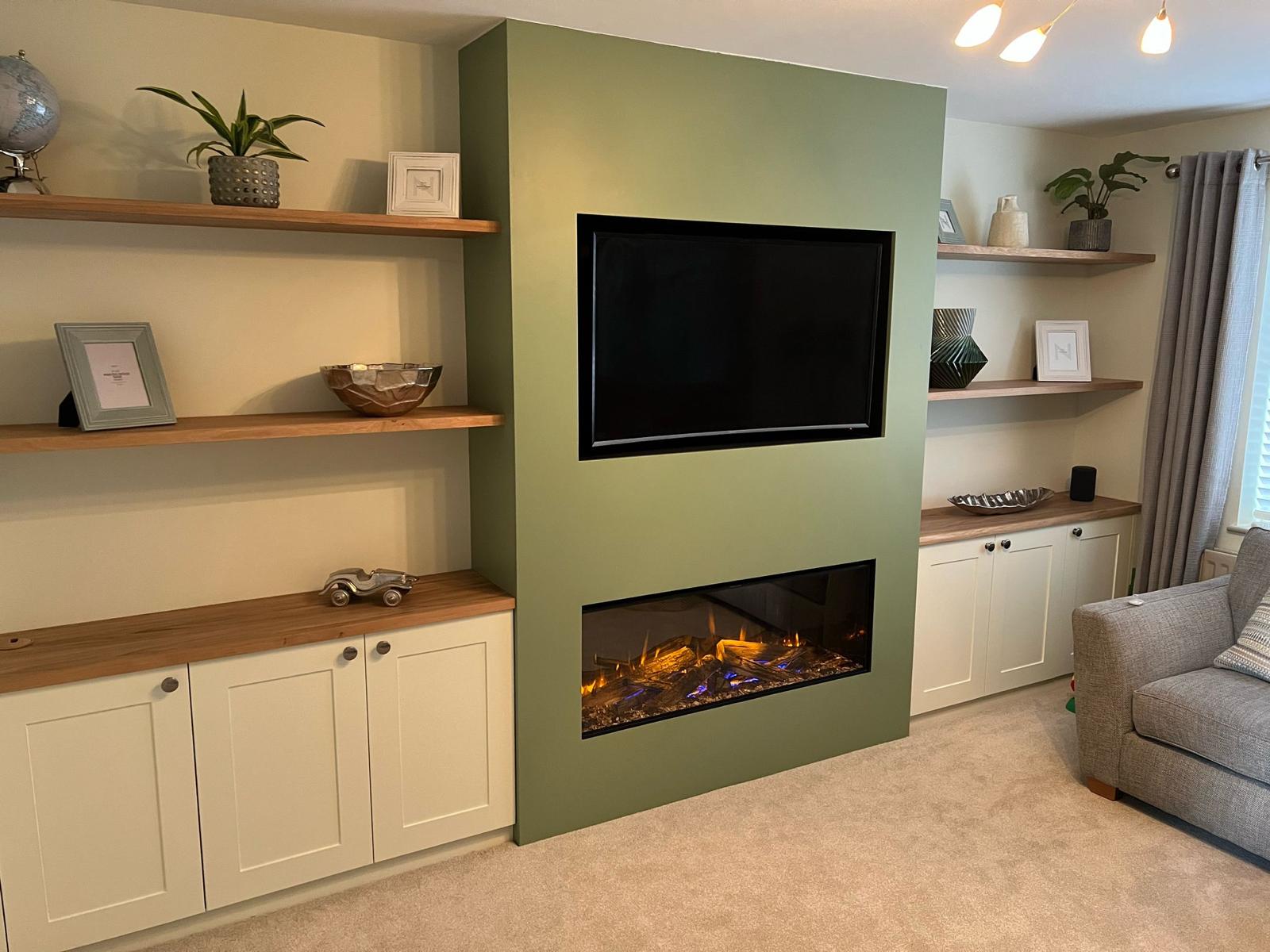 Media Wall with oak floating shelves in Harrogate