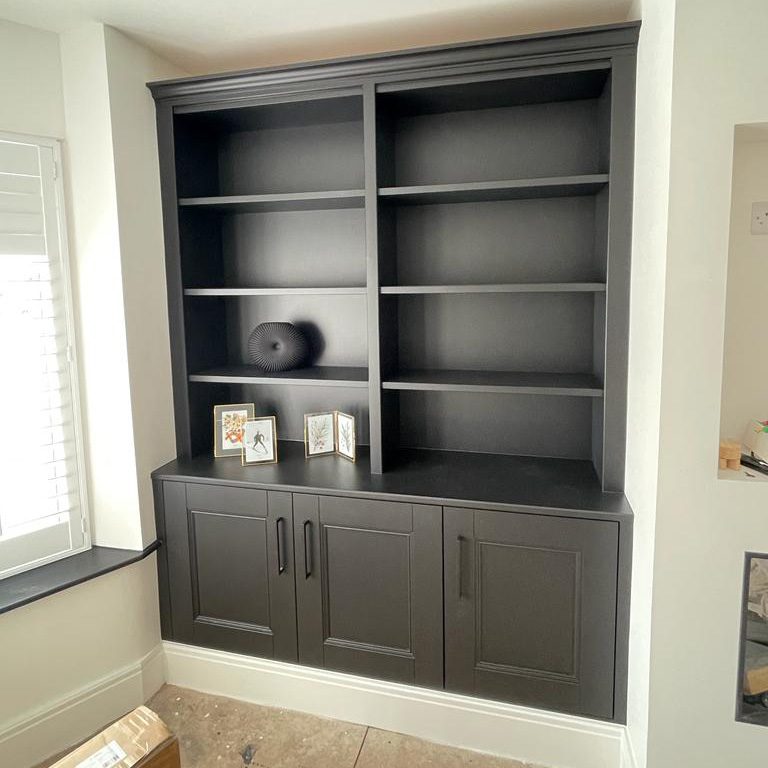 Traditional style bespoke alcove units in Harrogate finished in satin charcoal. Features - beaded shaker style doors, fixed shelving Cornice section